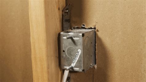 loose outlet box inside wall